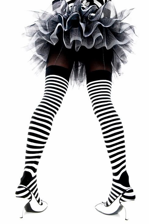 black and white striped background. Black and White Fashion