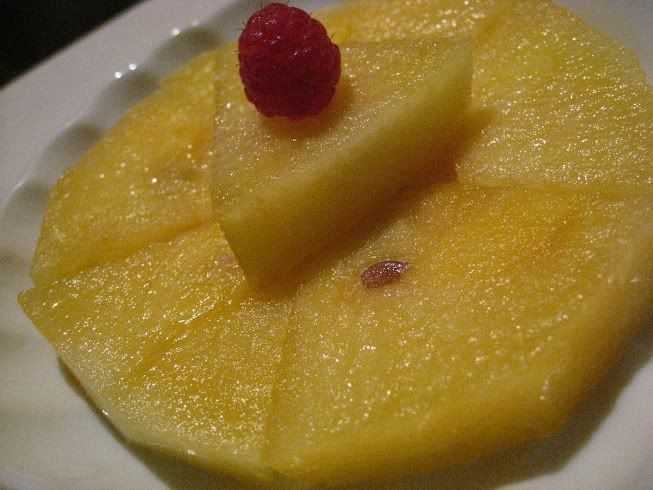 Yellow water melon, raspberries